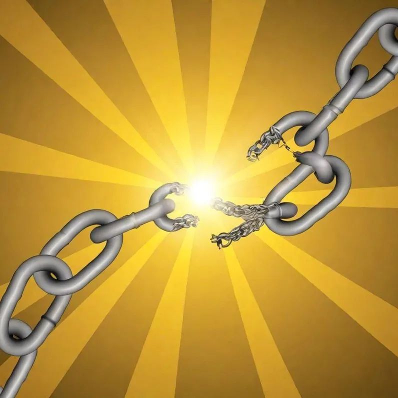 A chain snapping apart, light bursting out from the broken link